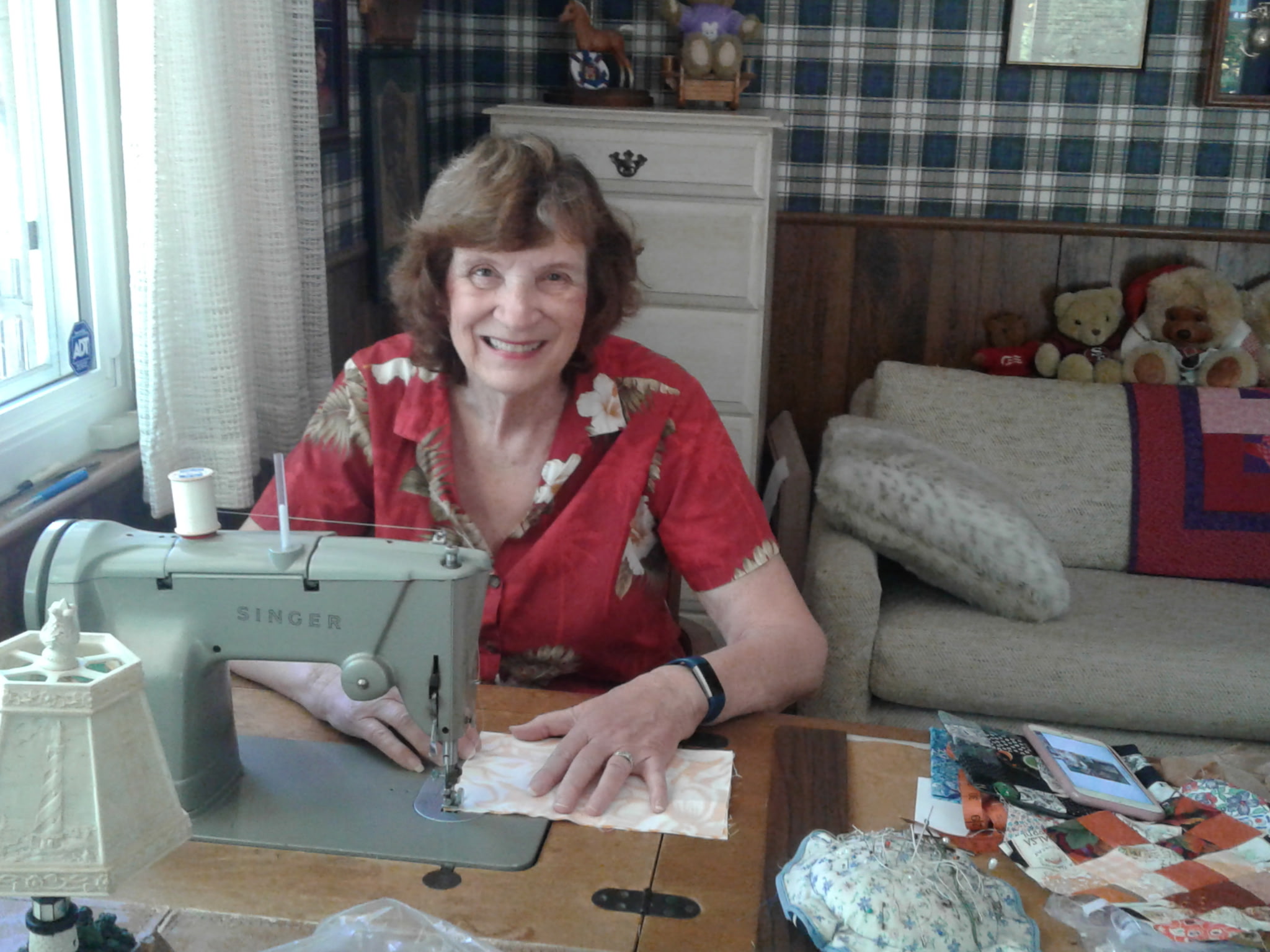 Gamma at her sewing machine