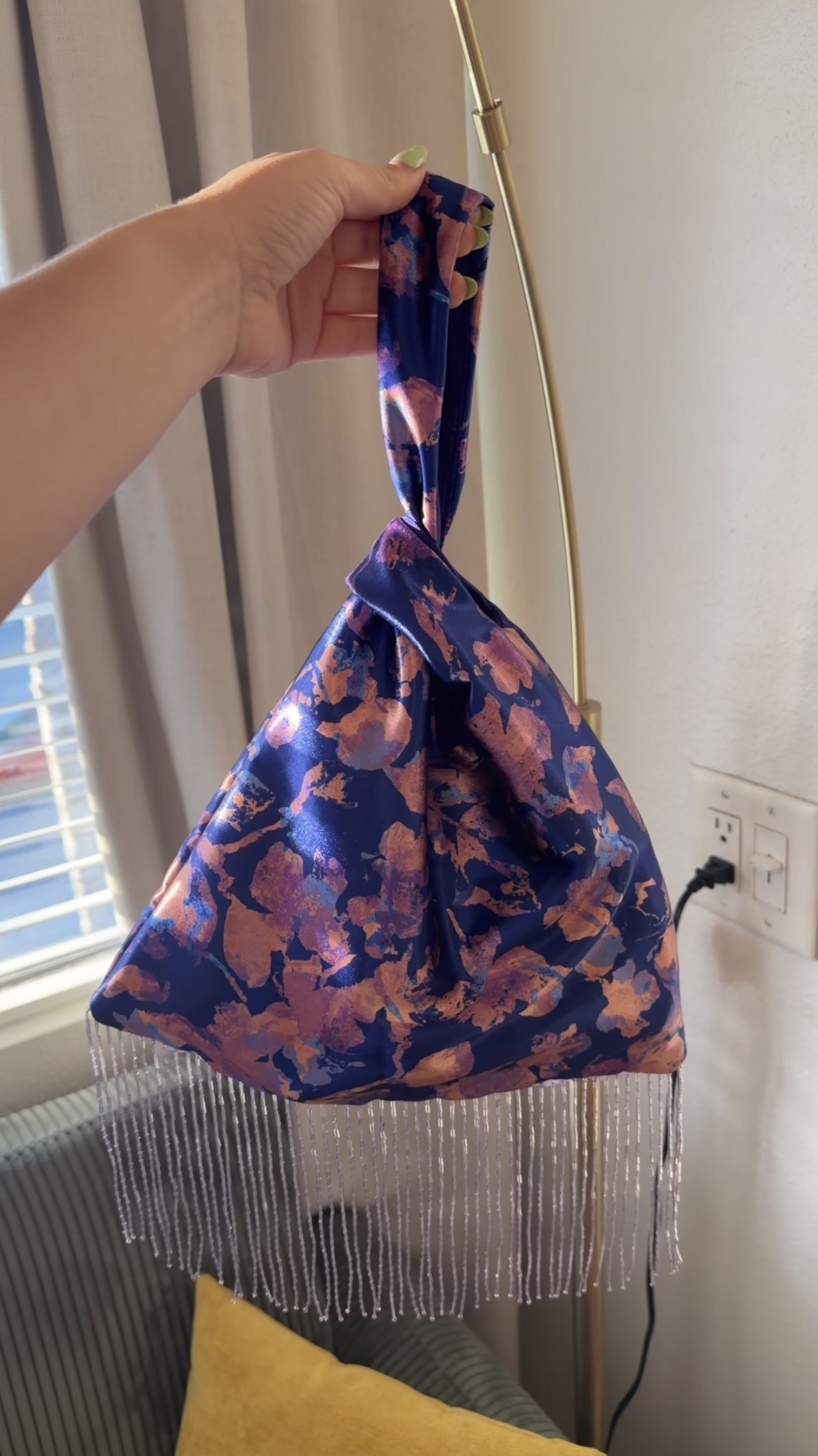 Finished Japanese knot bag in purple metallic fabric with lavender beaded trim
