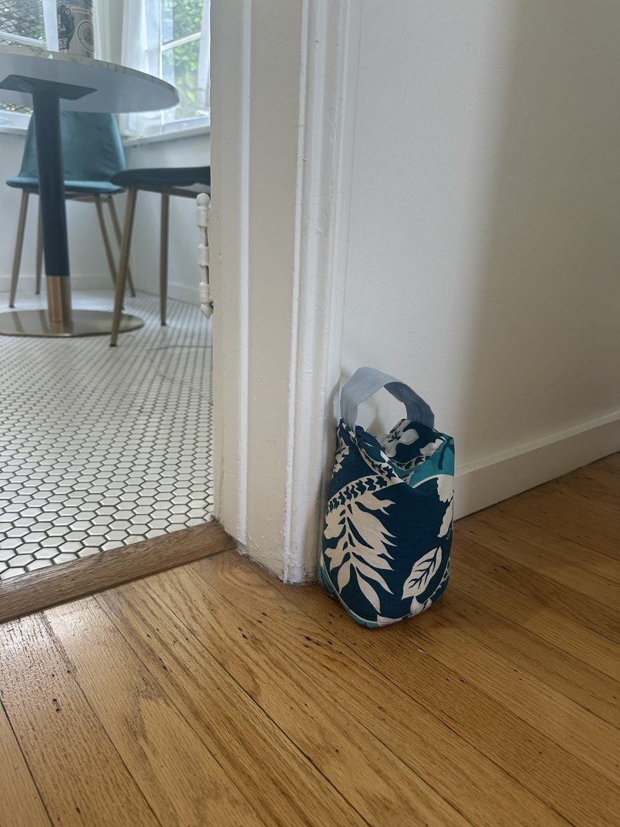 Handmade teal floral fabric door stop