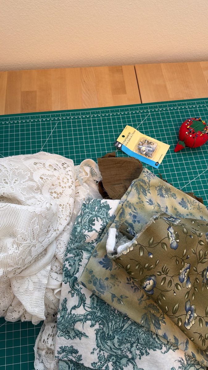 All the mixed fabrics laid out for the corset duster skirt panels