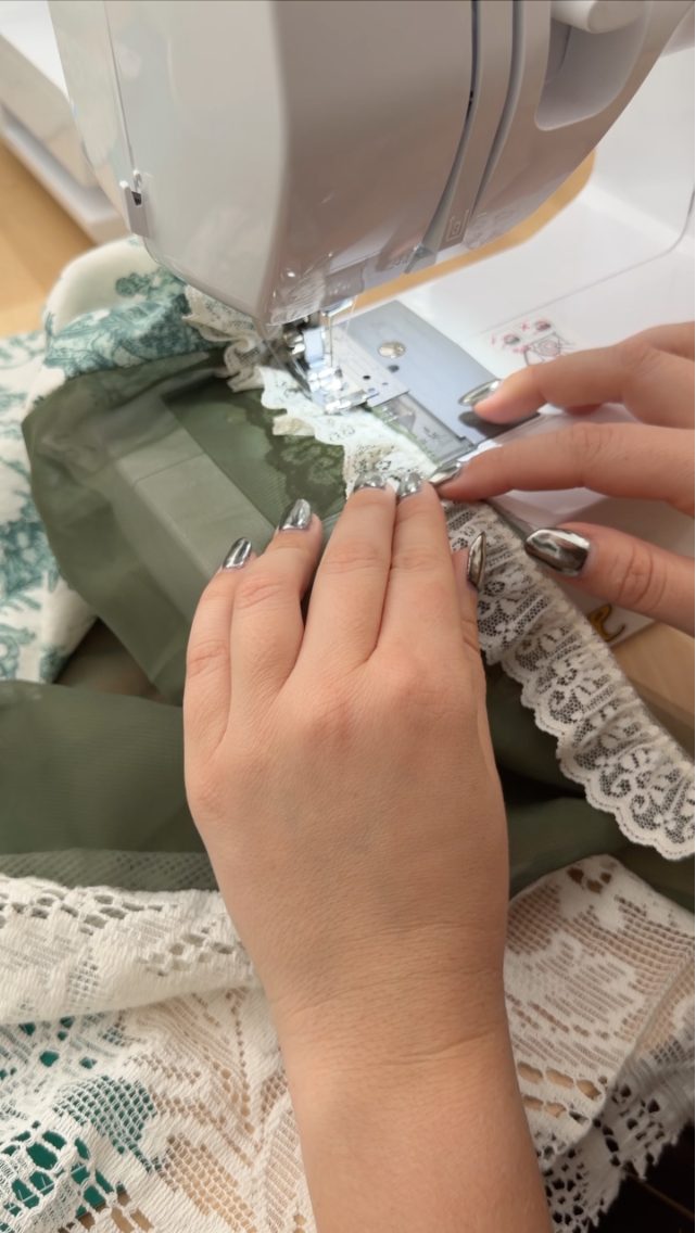 Adding grandma's lace to the hem of the corset duster skirt