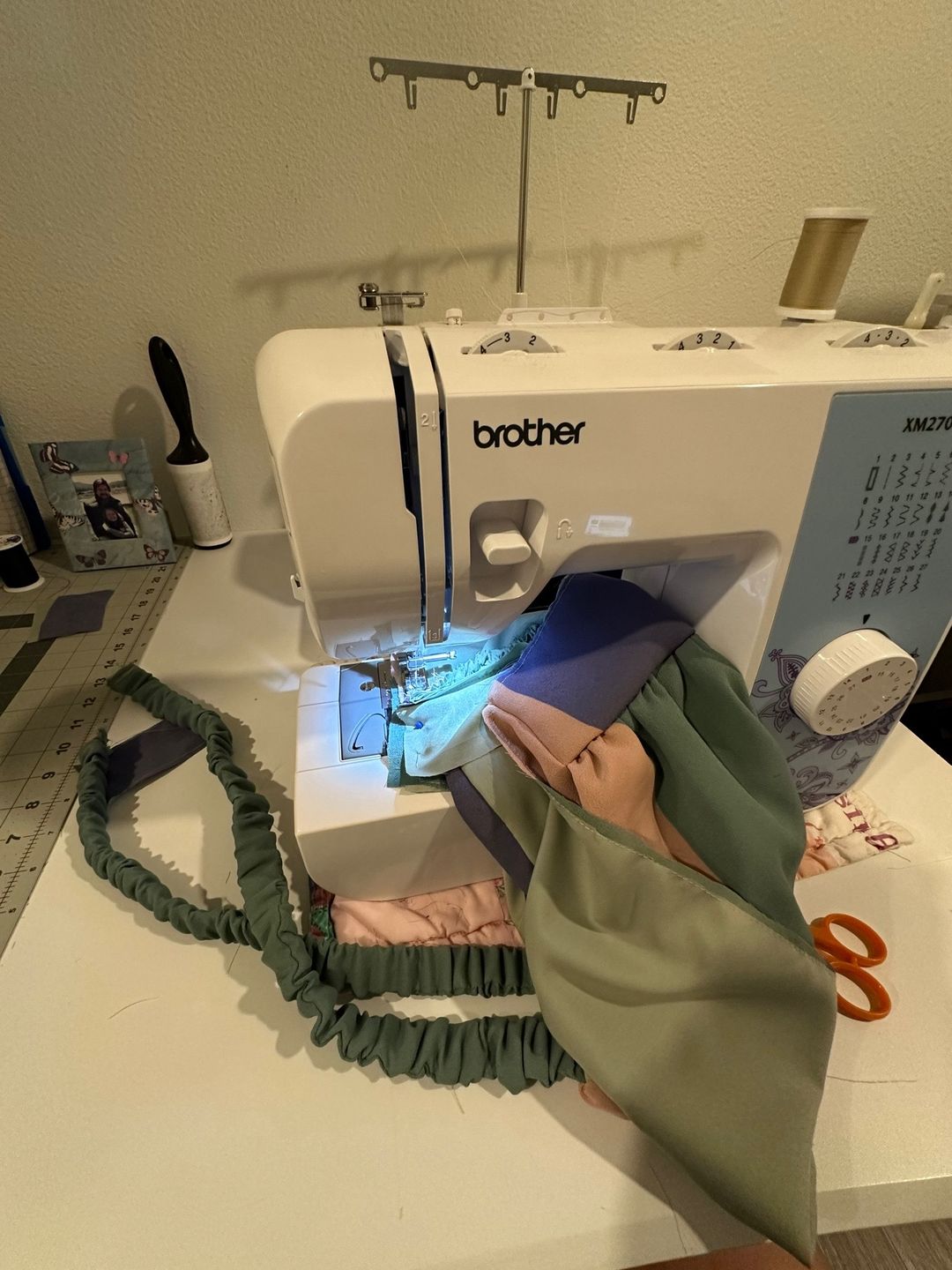 Sewing the elastic straps at the machine
